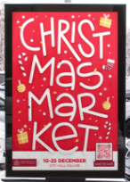 Code QR sur une affiche de Noël vers les détails d’un événement pour l’occasion.