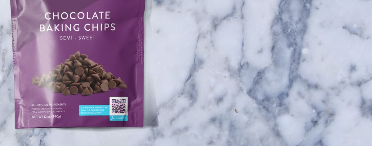 A purple package of a dark chocolate hazelnut bar with a QR Code printed on it.