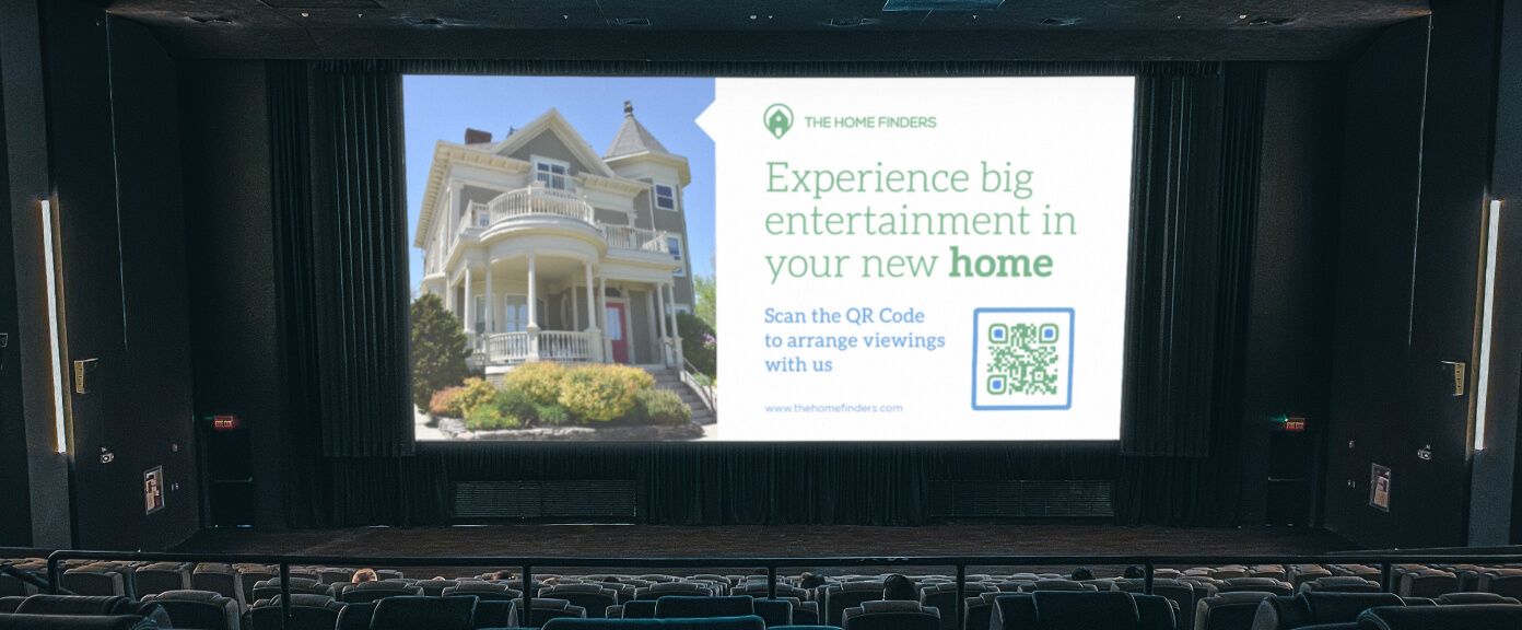 Idée de code QR sur une publicité au cinéma pour une agence immobilière