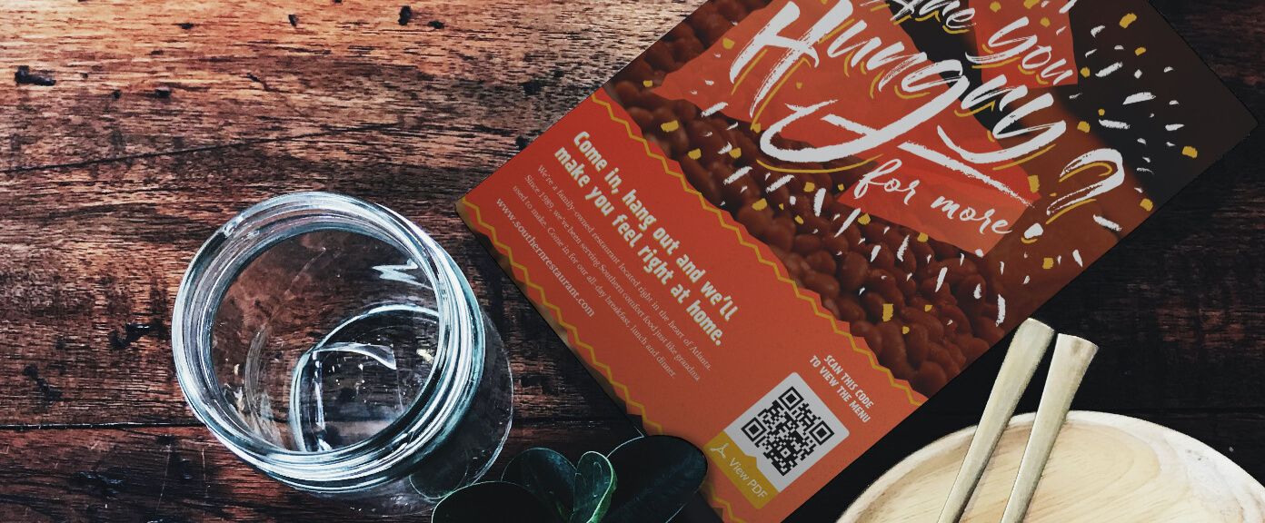 Prospectus promotionnel d’un restaurant avec code QR vers une version PDF du menu à emporter.